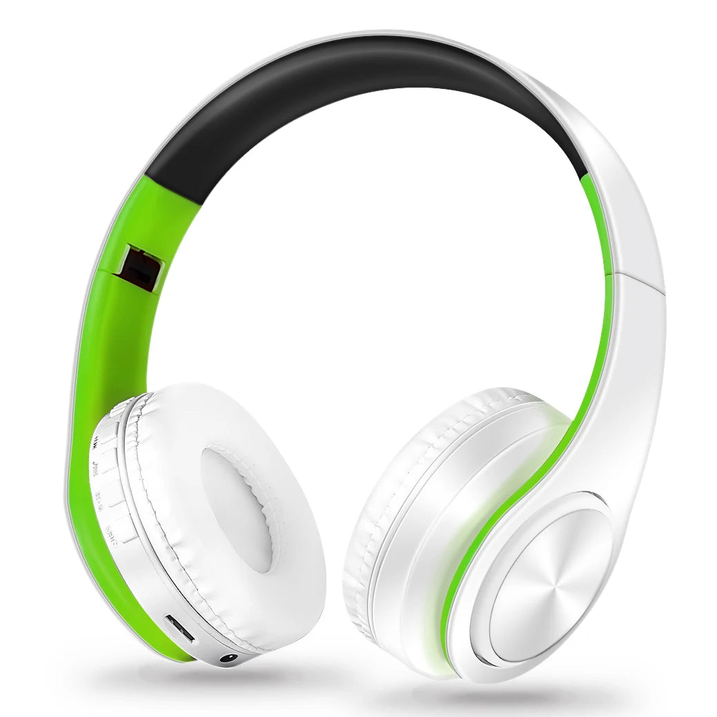 White and green headphones on a white background