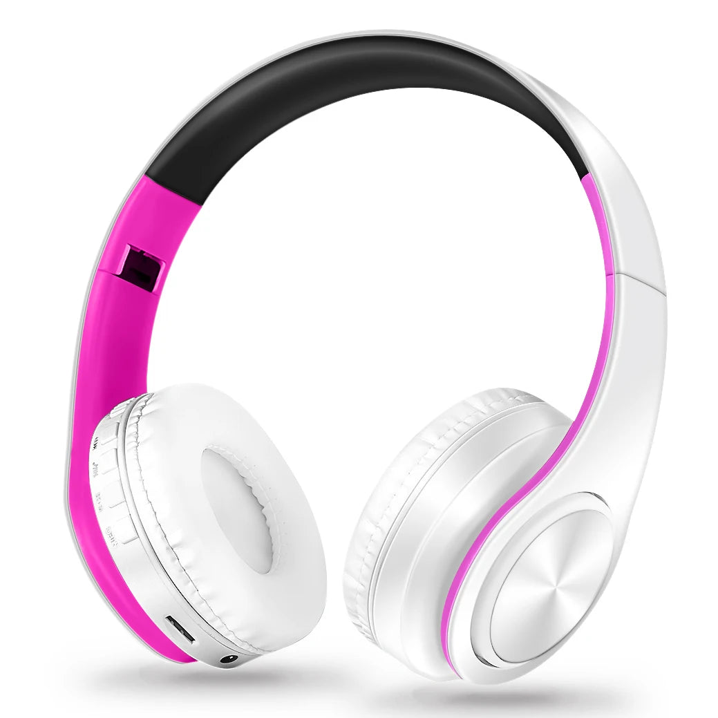 White headphones with pink accents on a white background