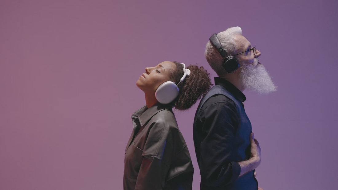 man and lady dancing with headphones